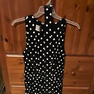 Vintage tea length dress never worn, new without tags.